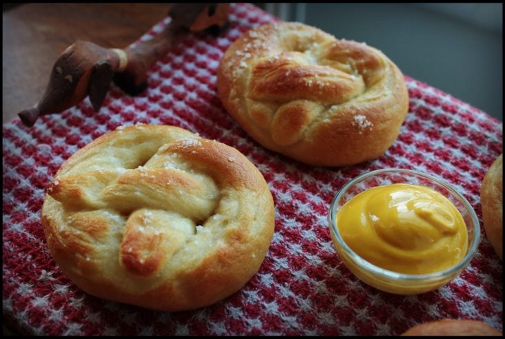 Golden baked soft pretzels with mustard dip.