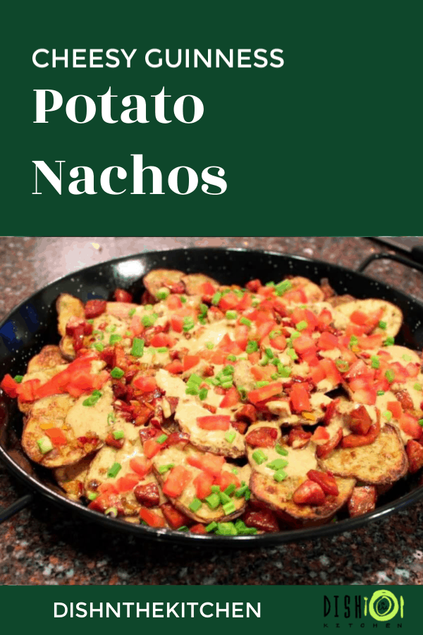 These Cheesy Guinness Potato Nachos are the perfect snack. Made with potato skins, tomatoes and a zesty Guinness enriched cheese sauce, you'll be hard pressed to find a more delicious pile of nachos. #nachos #GuinnessCheeseSauce #Potatonachos #potatoskins #appetizers #appys