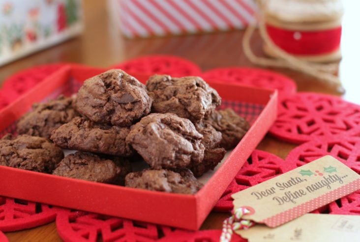 Ancho Chili Chocolate Cookies Pinterest image of brown cookies in a red gift box.