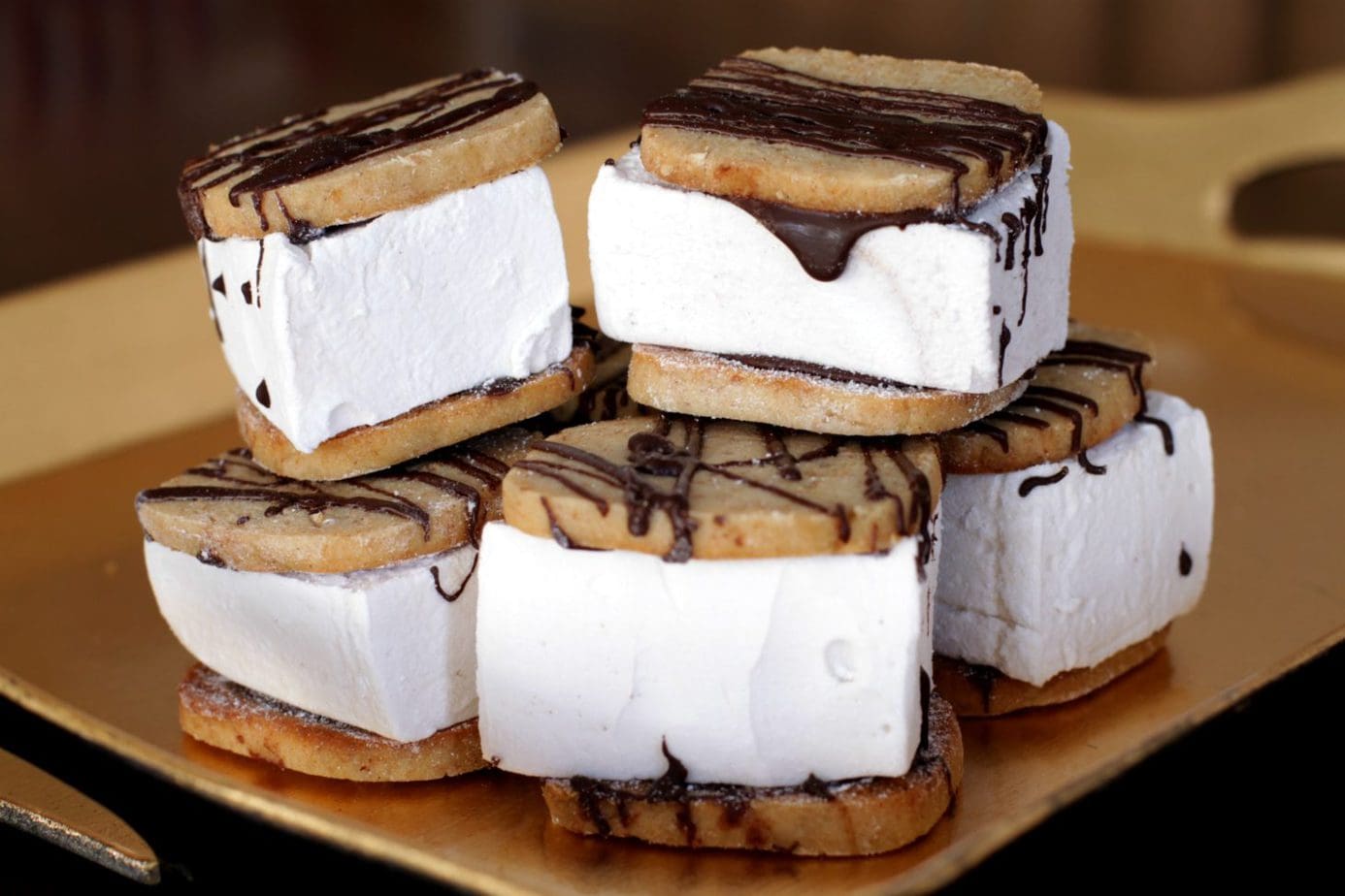S'mores are a campfire favourite you can create right from scratch. Then enjoy these soft, vanilla flavoured marshmallows sandwiched between crumbly graham cookies...hot or cold! #smores #marshmallows #dessert #grahamcrackers