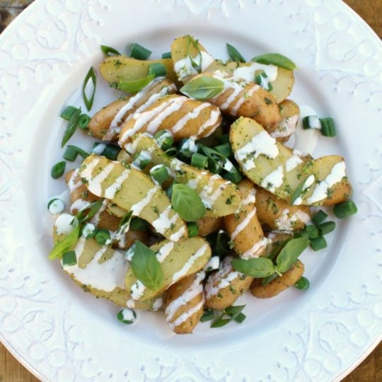 A bright modern take on classic potato salad. #fingerlingpotatoes #potatoes #pestocream #CrèmeFraîche
