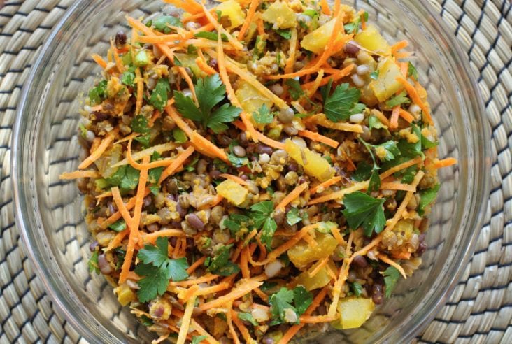 A bowl filled with colourful chopped Roasted Golden Beets and Carrot Salad.