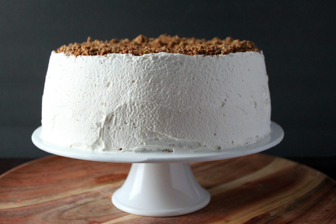 A soft n chewy pecan torte layered with sweetened whipping cream