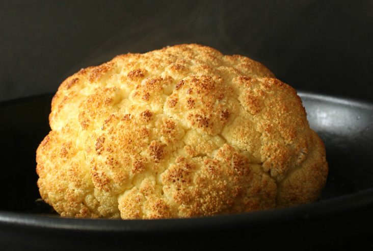 A Perfectly Whole Roasted golden Cauliflower