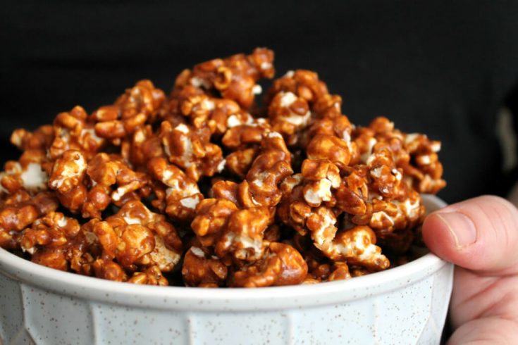 A bowl filled with Gingerbread Caramel Popcorn