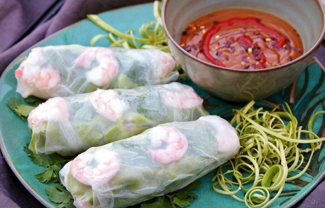 These Vietnamese Shrimp Salad Rolls are so fresh and healthy. They're easier to make than you think...you'll be rolling in no time! Served with a completely addictive authentic peanut dipping sauce. #saladrolls #VietnameseRolls