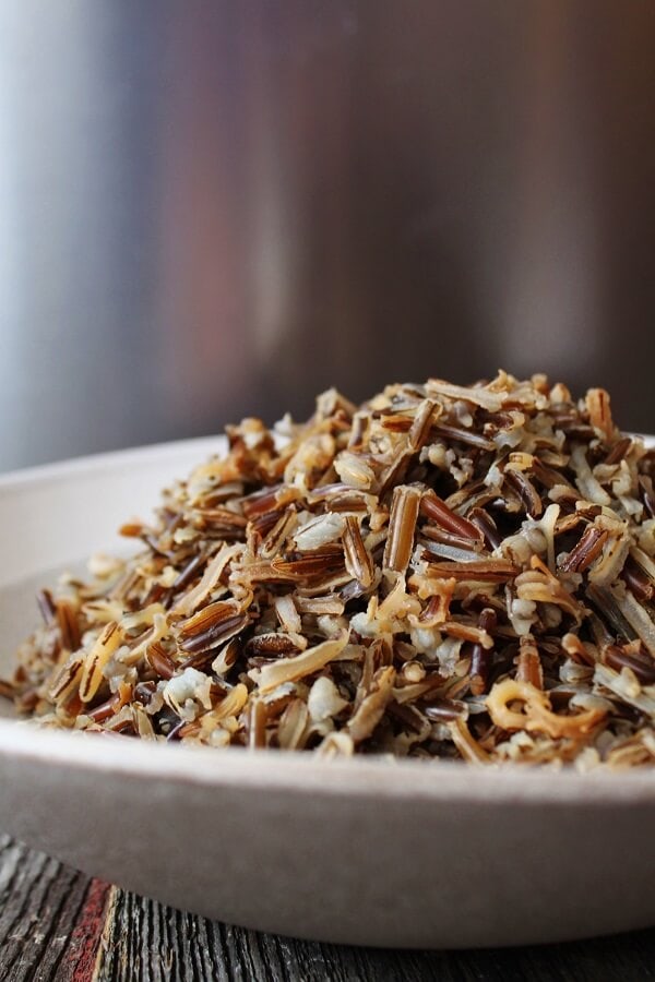 A quick tutorial on how to cook the best wild rice right on your stove. Serve as a side dish or add this healthy grain to salads or soups. #wildrice #rice #sides