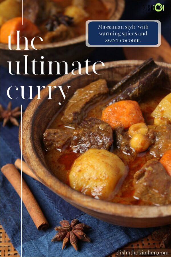 Pinterest image of Massaman Beef Coconut Curry - A wooden bowl filled with bites of potato, sweet potato, and beef in a rich sauce. 