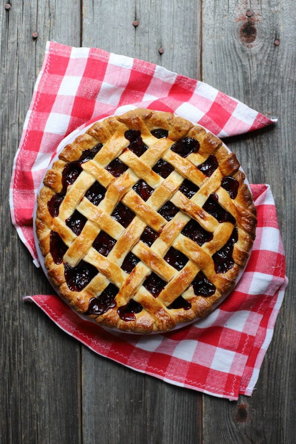 Cherry pie with golden baked lattice top.