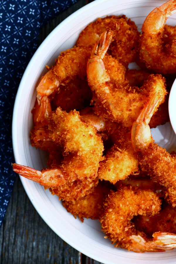 A bowl of crispy golden fried shrimp.