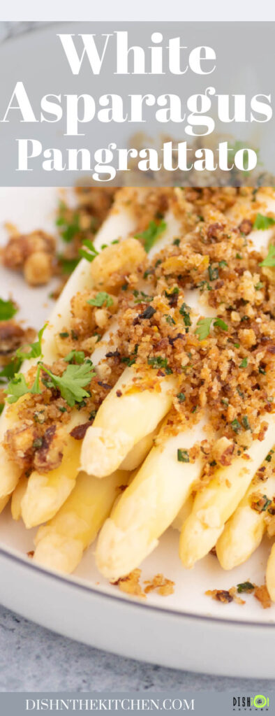 PInterest image of steamed white asparagus covered in a herbed pangrattato.