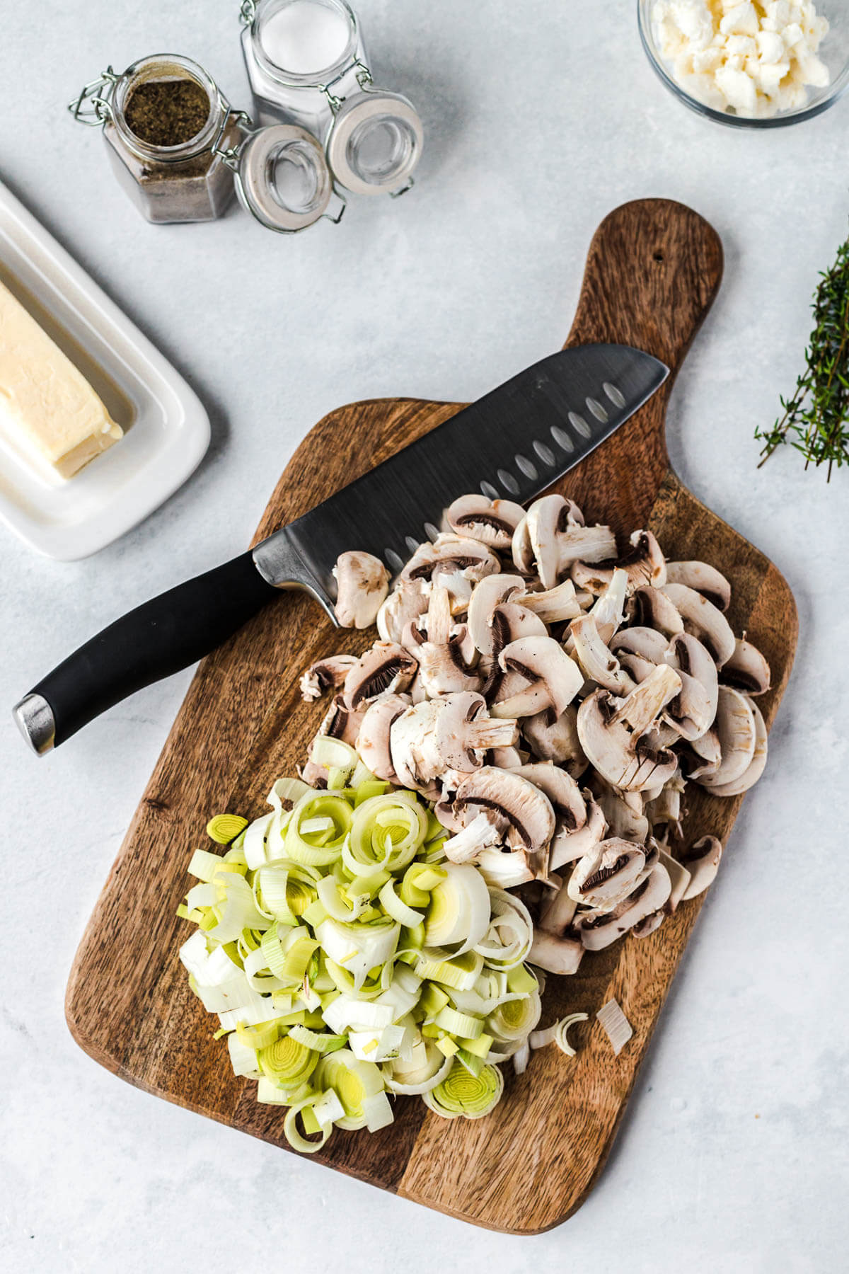 Prepped ingredients for mushroom goat cheese filo pastry parcels.