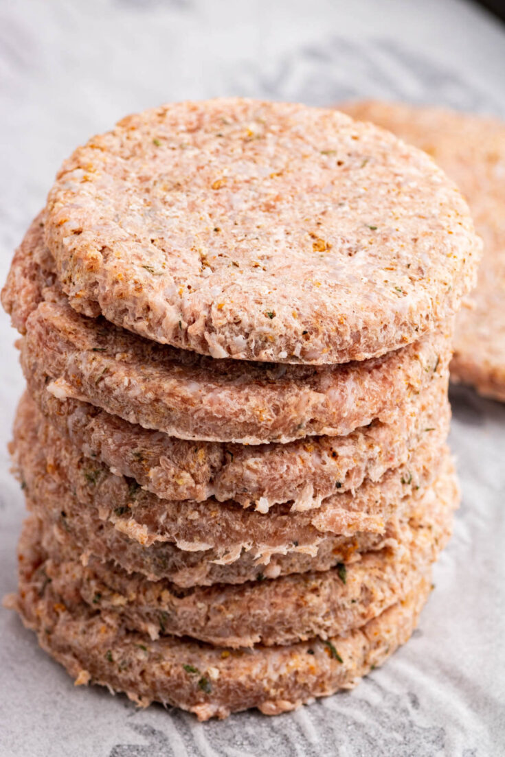 A stack of smoked breakfast sausage patties.