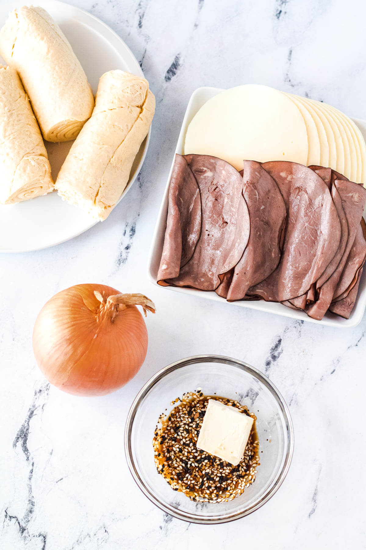 Ingredients required to make beef pinwheel appetizers.