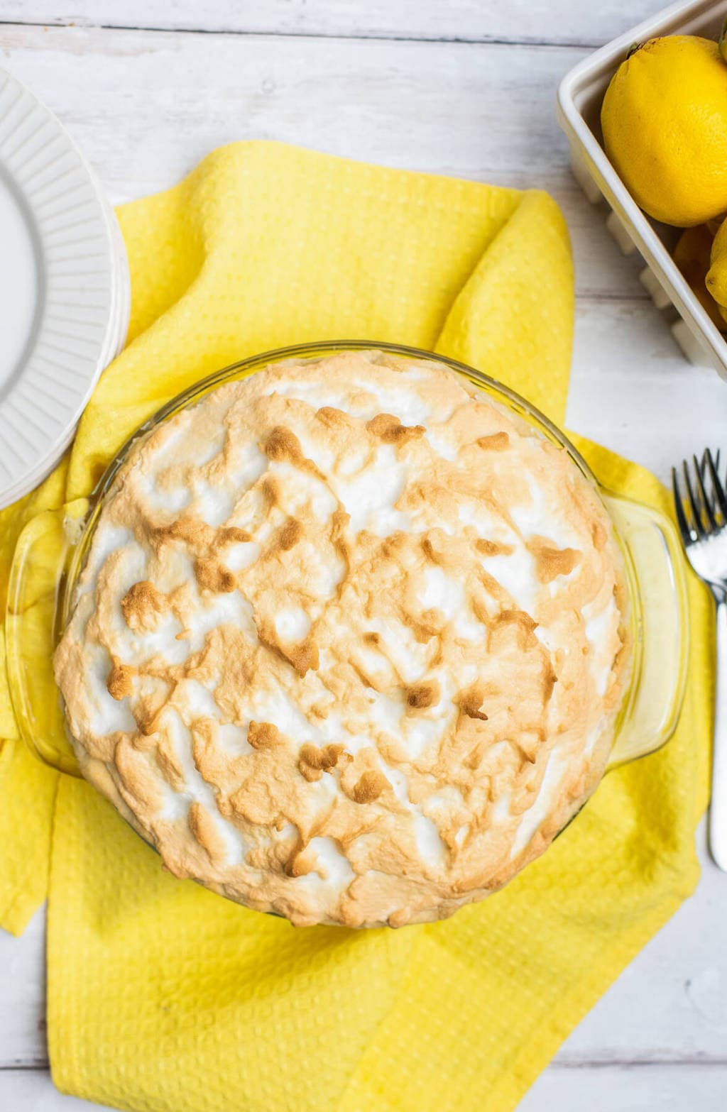 A full lemon meringue pie with baked meringue. 