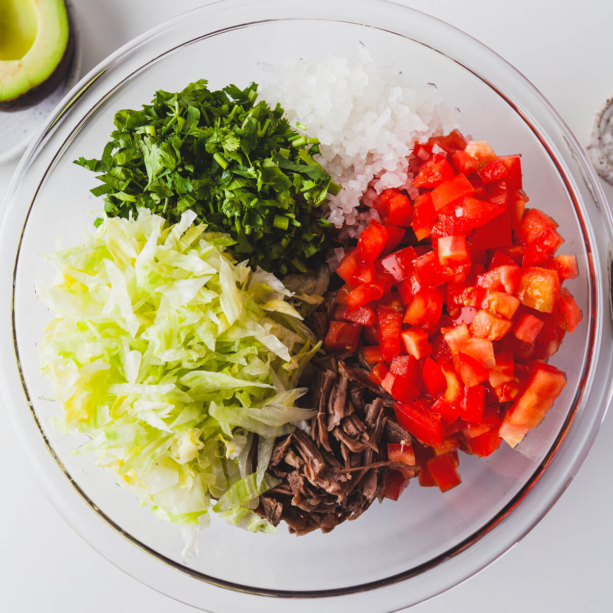 Ingredients for Salpicón (Mexican Shredded Meat Salad) before being mixed together.