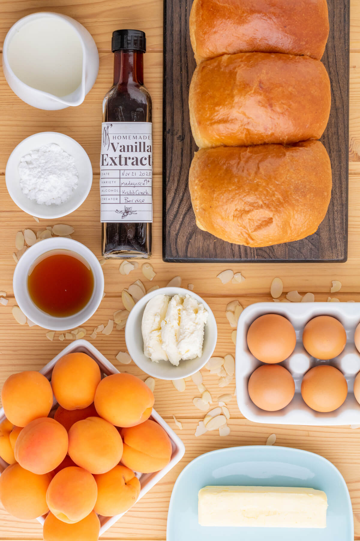 Ingredients needed to make Brioche French toast with whipped Mascarpone cream and fresh apricots.