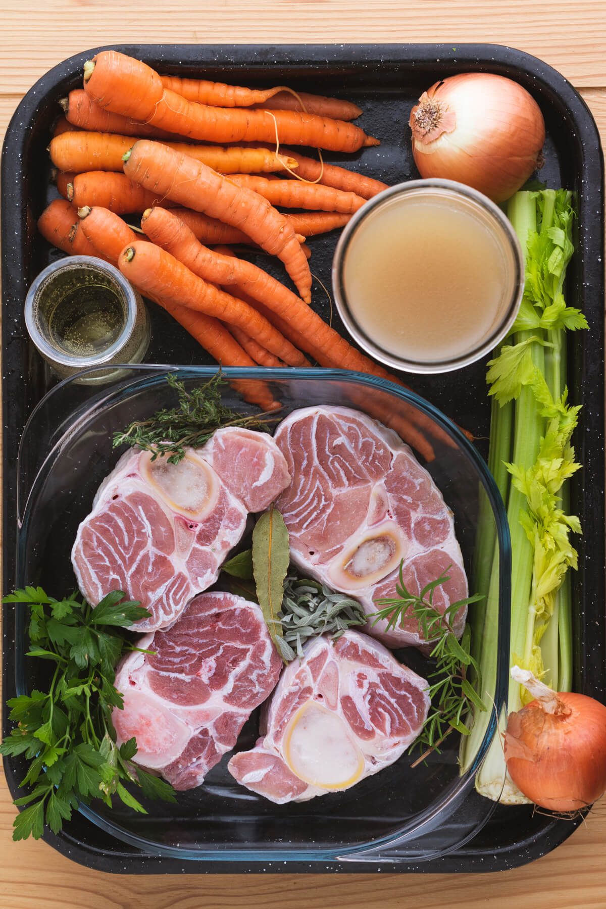 Ingredients required to make an authentic Milanese Osso Bucco Recipe.