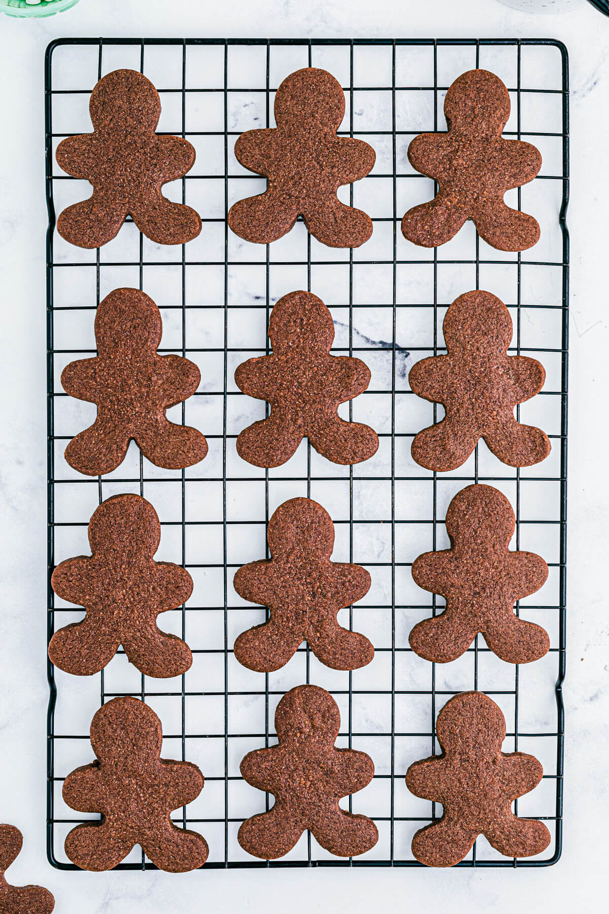 Chocolate Halloween Sugar Cookies cooling on a wire cooling rack.