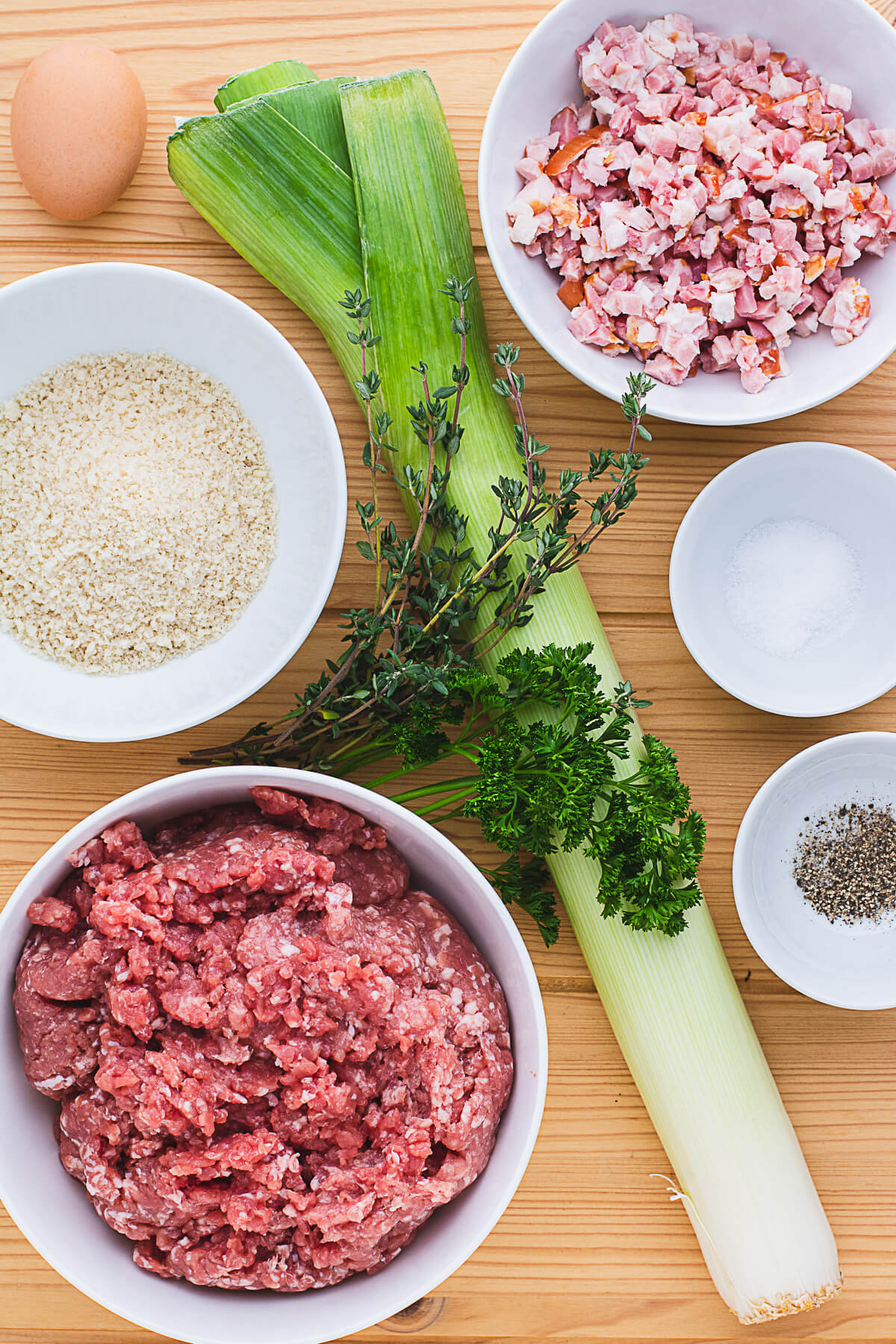 Ingredients required to make Pork Meatloaf with leeks and bacon.