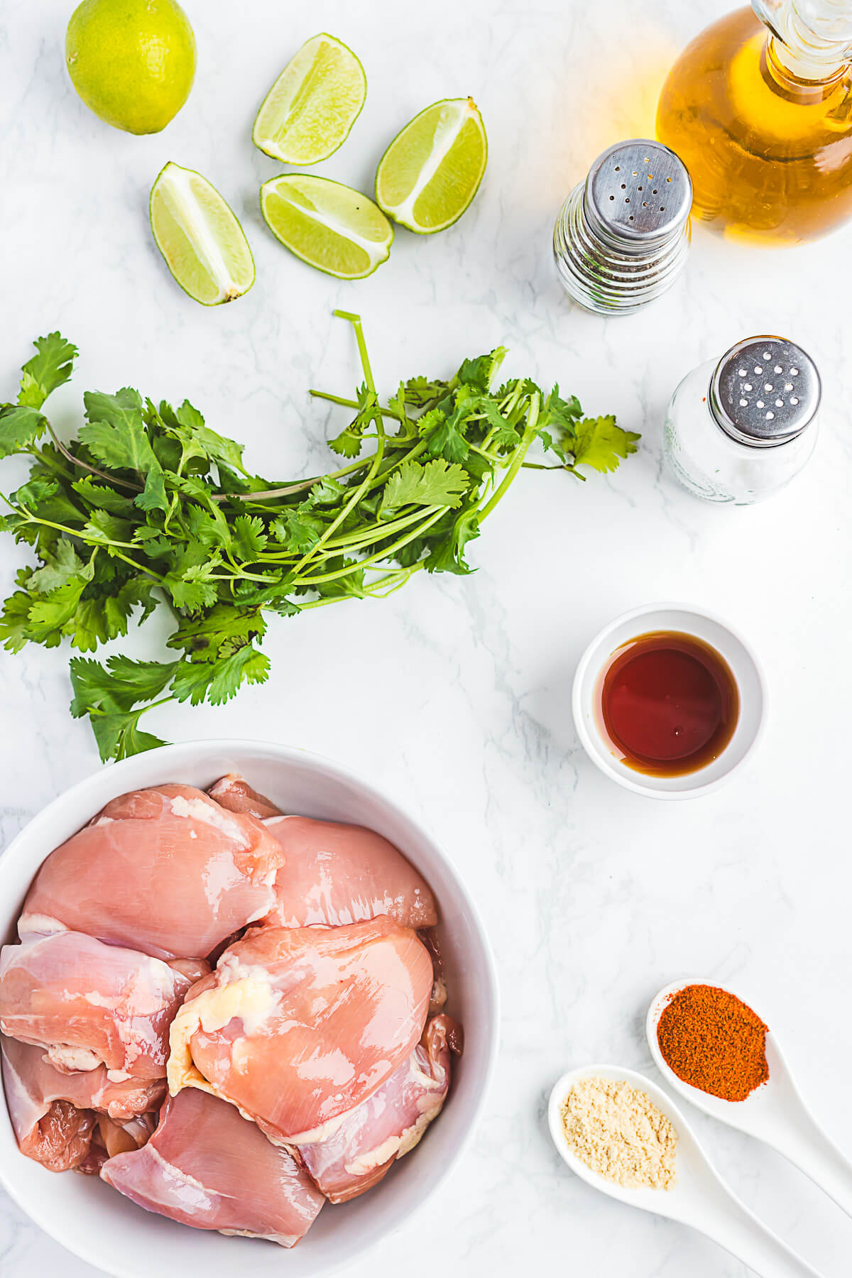 Ingredients required to make cilantro and lime marinated grilled chicken thighs.
