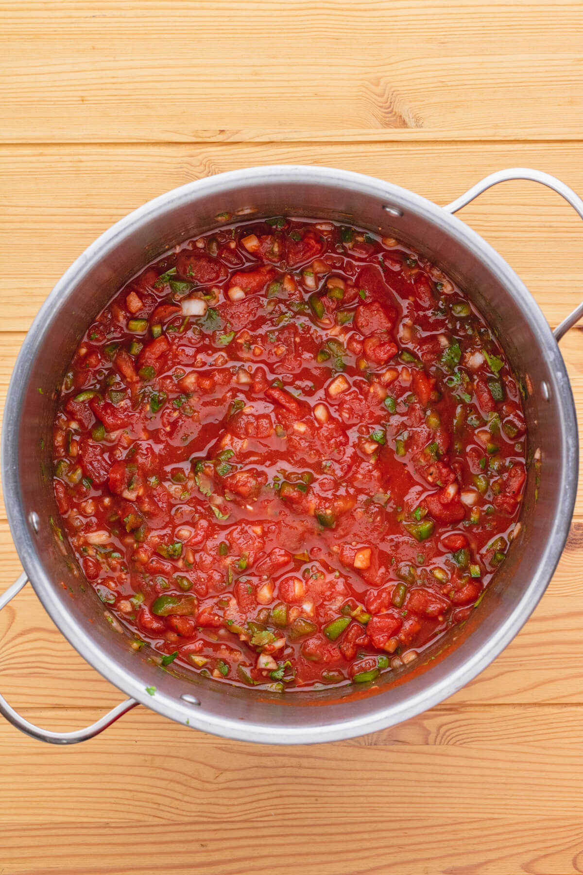 Cooked salsa in a stock pot. 