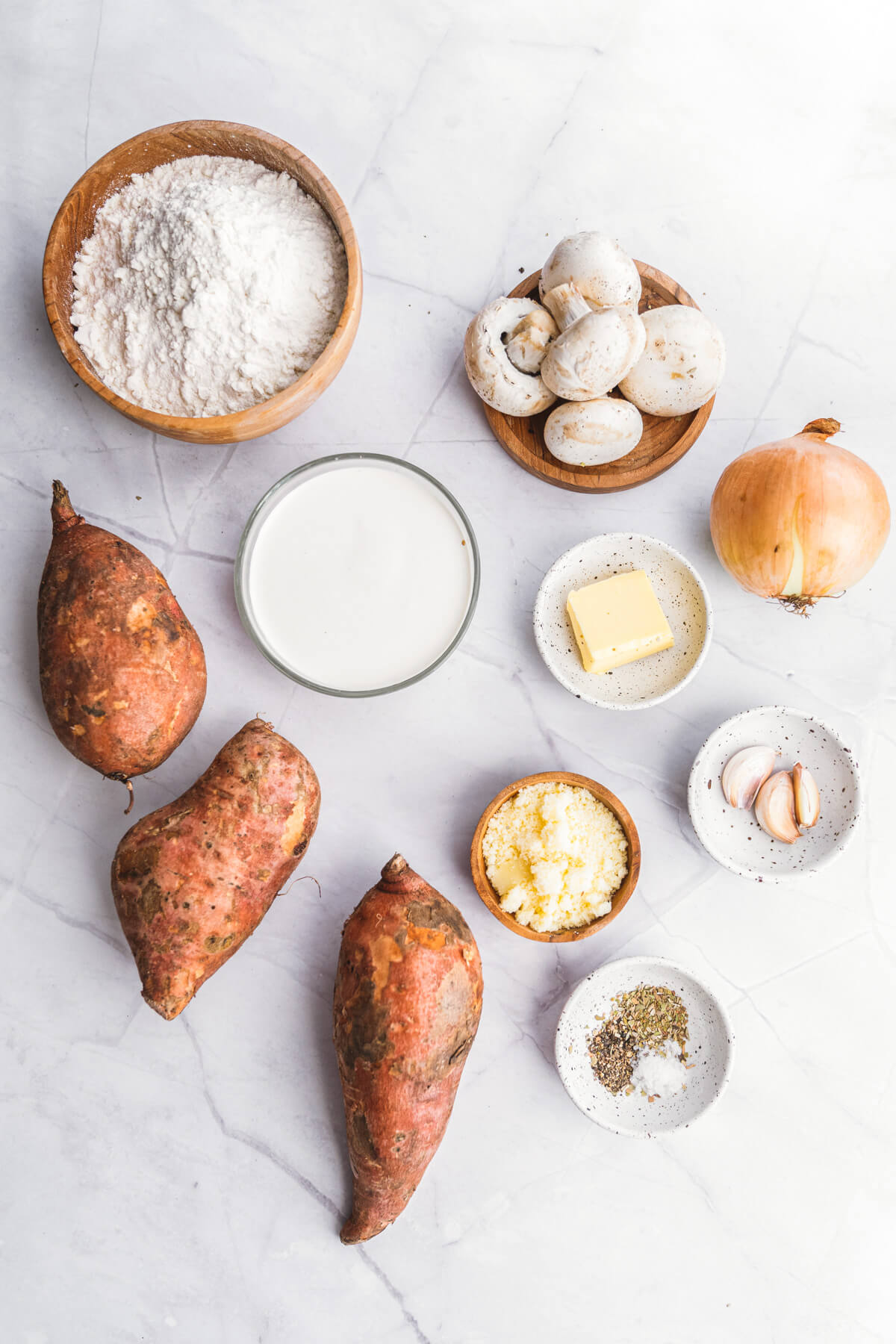 Ingredients required to make sweet potato gnocchi in a creamy mushroom sauce. 