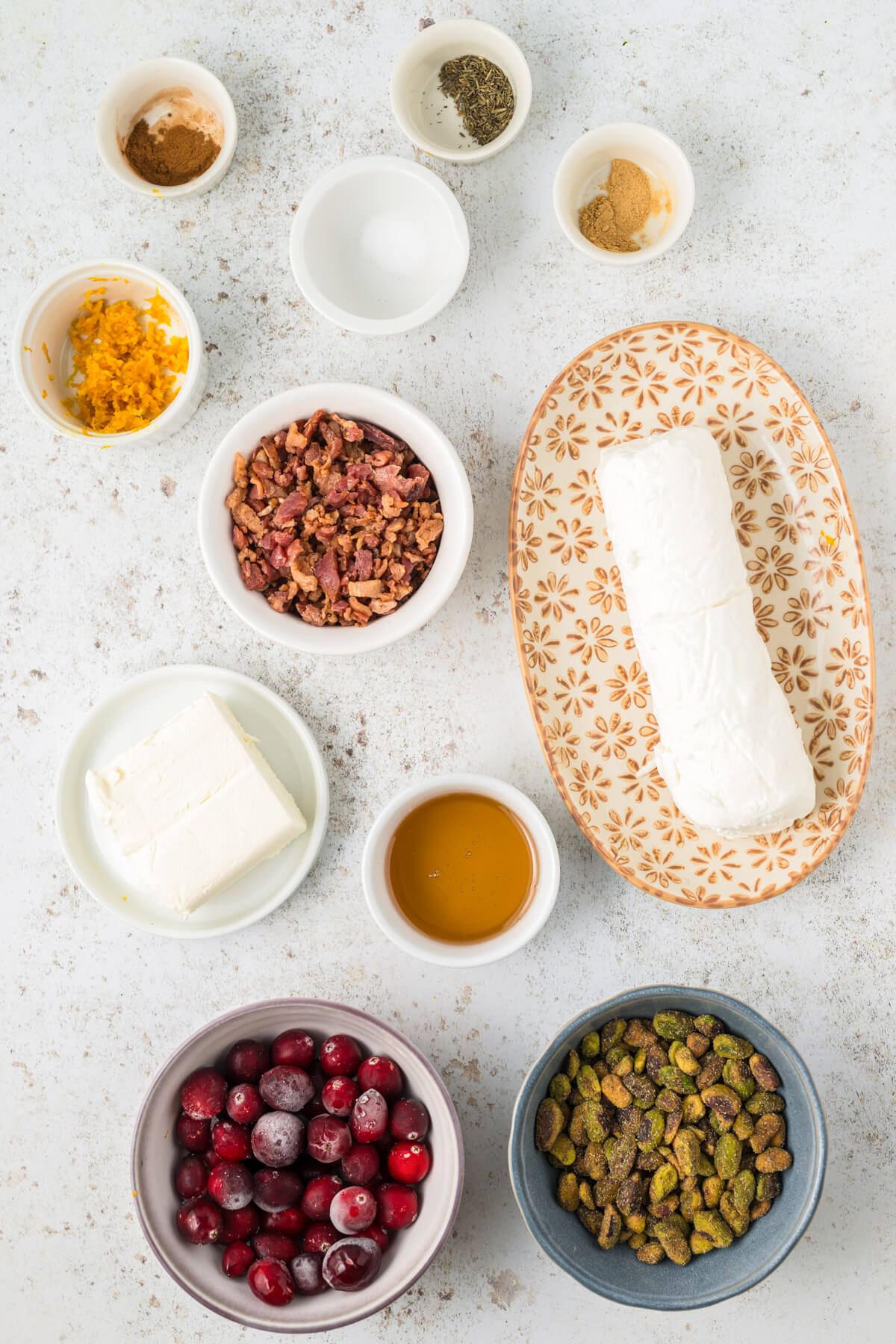 Ingredients required to make a Pistachio Cranberry Cheese Log.