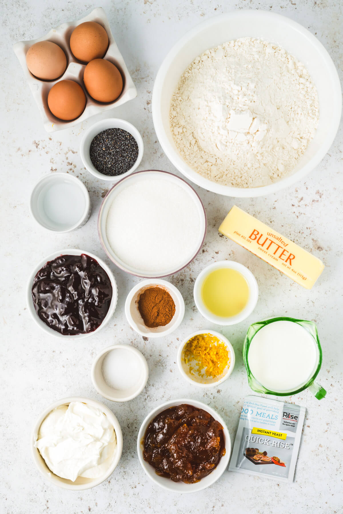 Ingredients required to make homemade kolaches and a variety of fillings.
