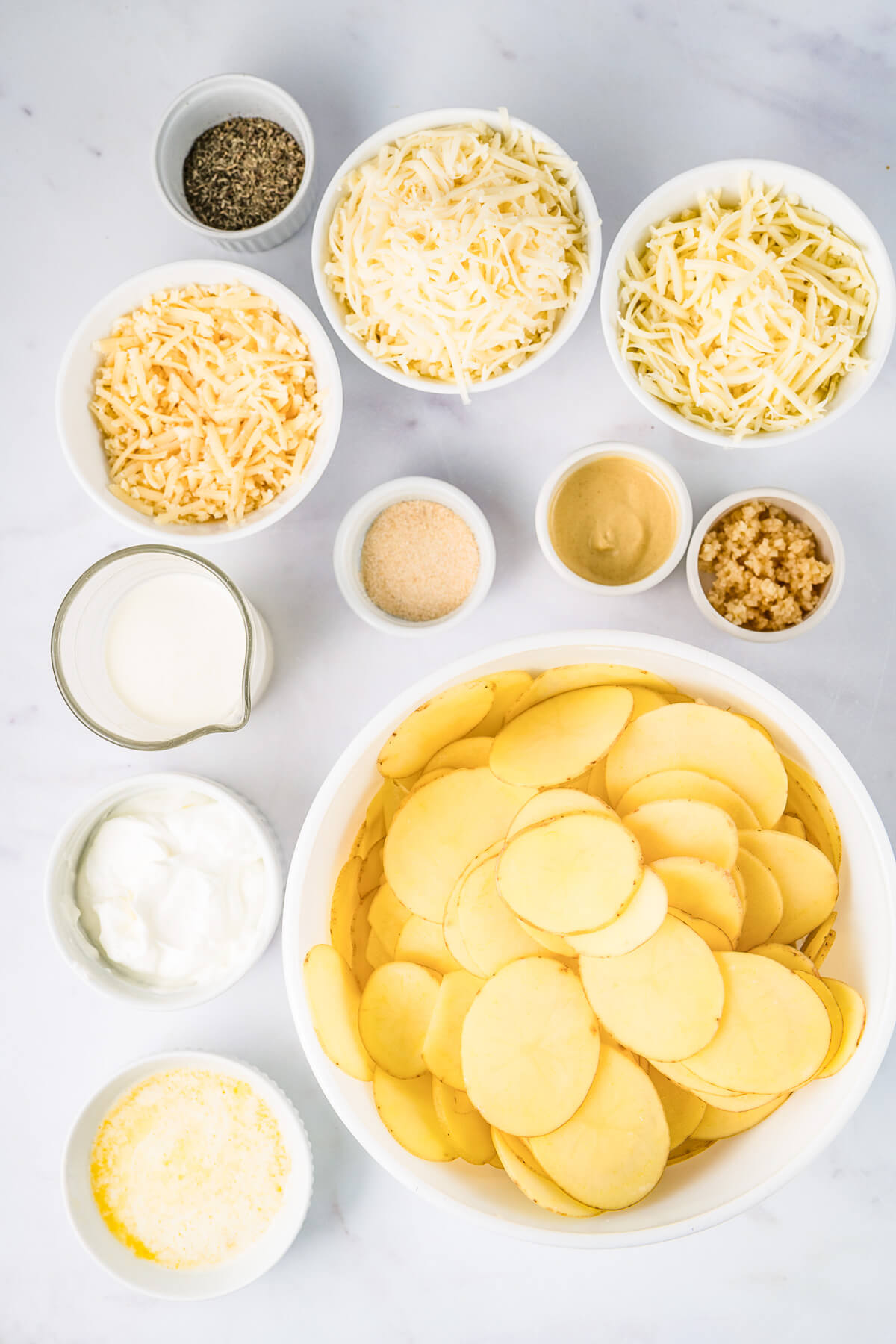 Ingredients required to make Potatoes Dauphinoise or Potatoes au Gratin.