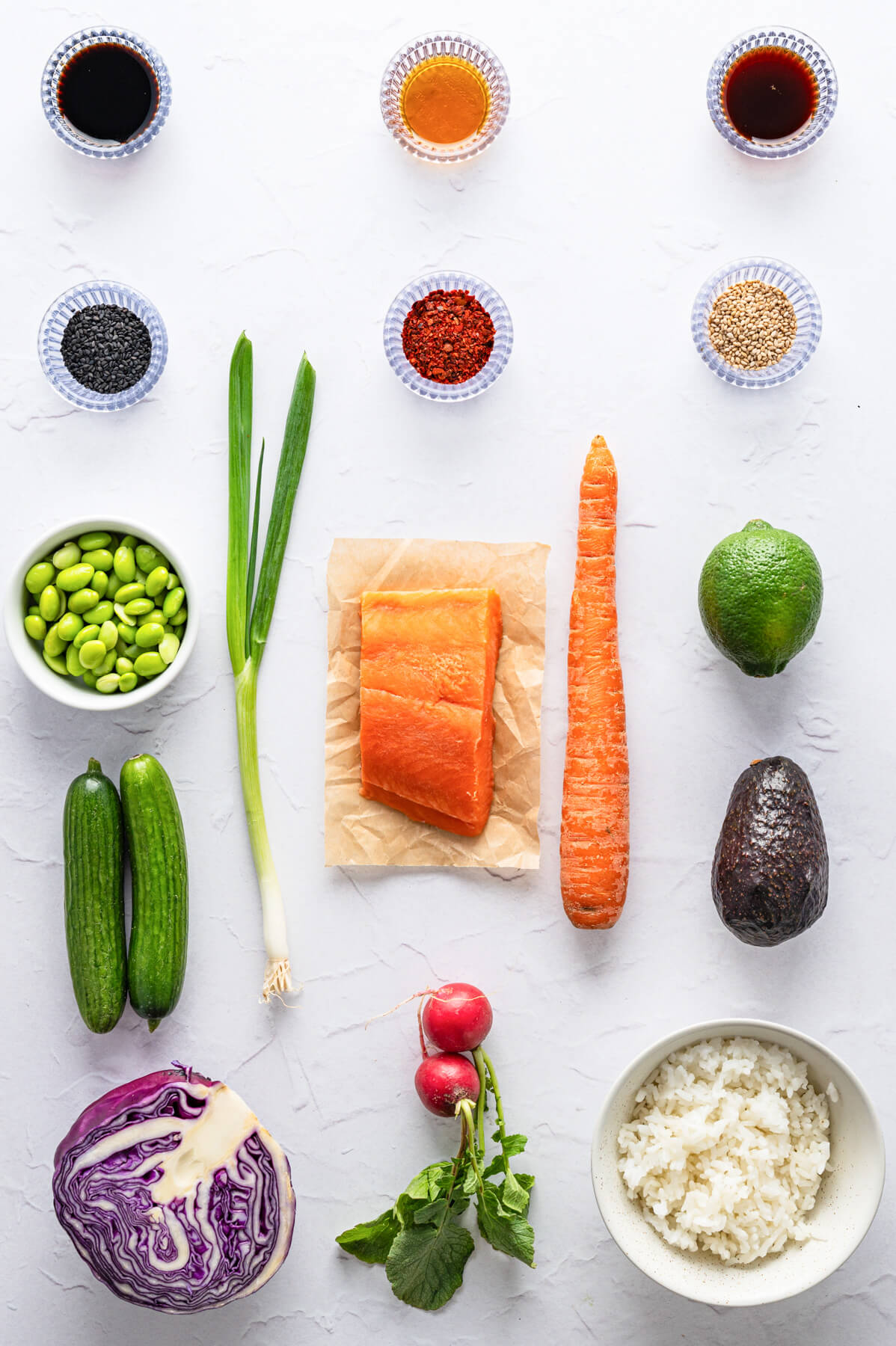 Ingredients required to make salmon poke bowls.