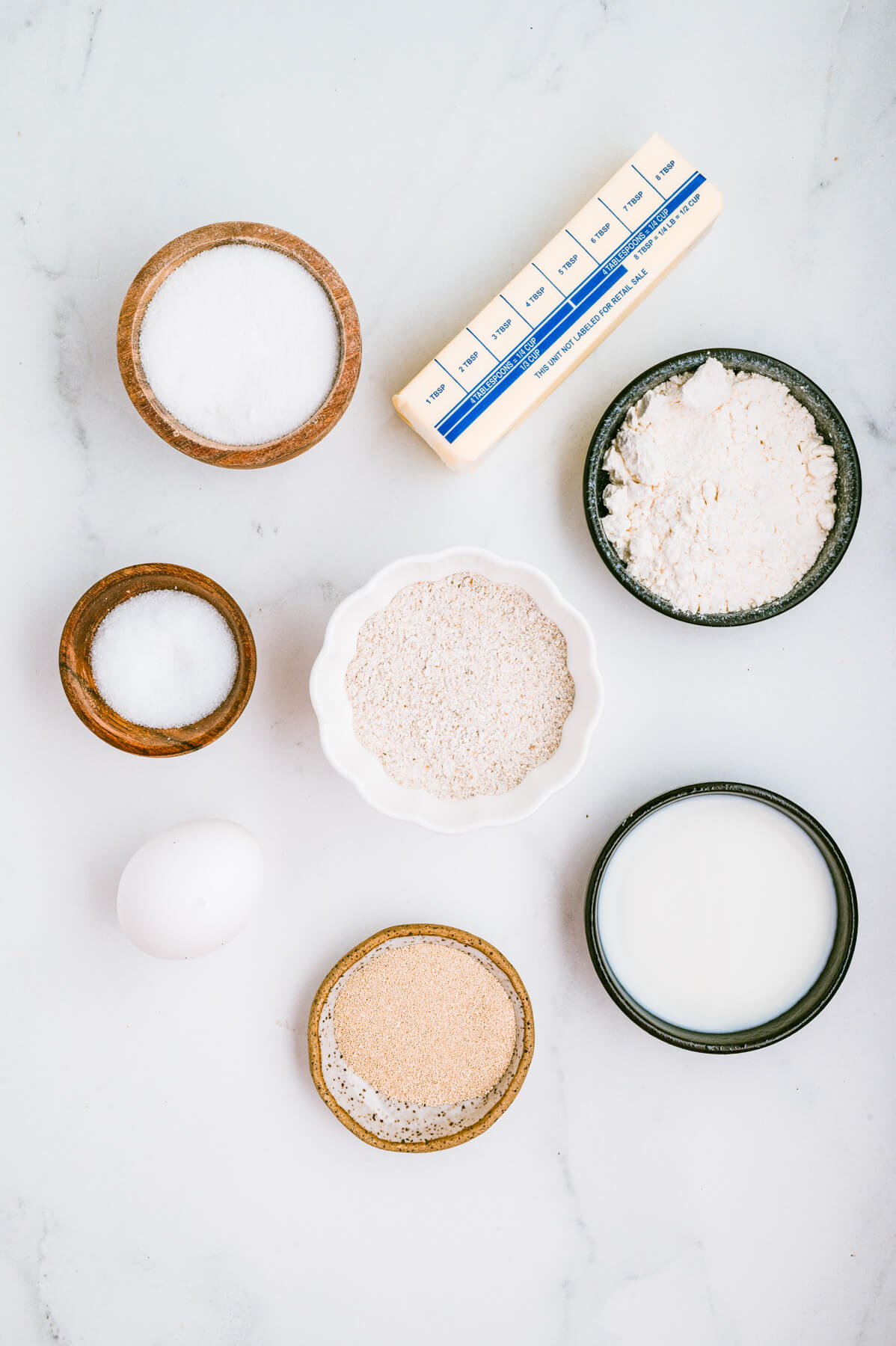Ingredients required to make rye dinner rolls.