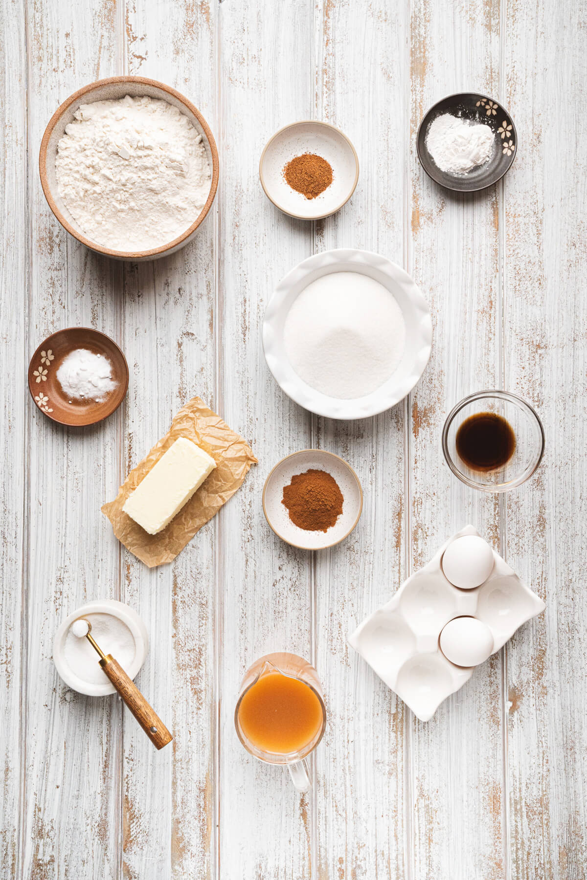Ingredients required to bake an apple cider donut cake.