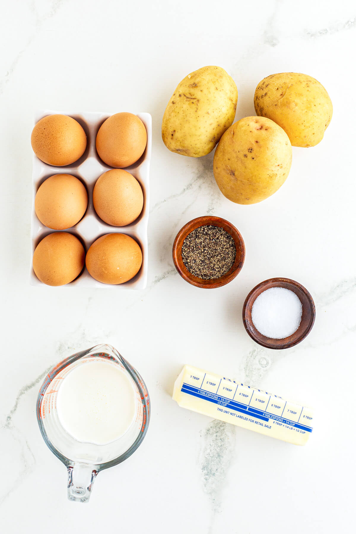 Ingredients required to make Pommes Duchesse or Duchess Potatoes.