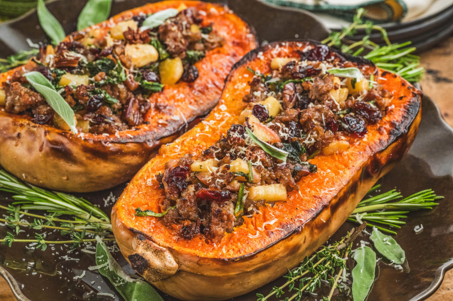 Bright orange roasted squash filled with Italian sausage, pecans, herbs, and dried cranberries then topped with Parmesan cheese.