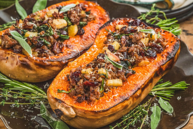 Bright orange roasted squash filled with Italian sausage, pecans, herbs, and dried cranberries then topped with Parmesan cheese.