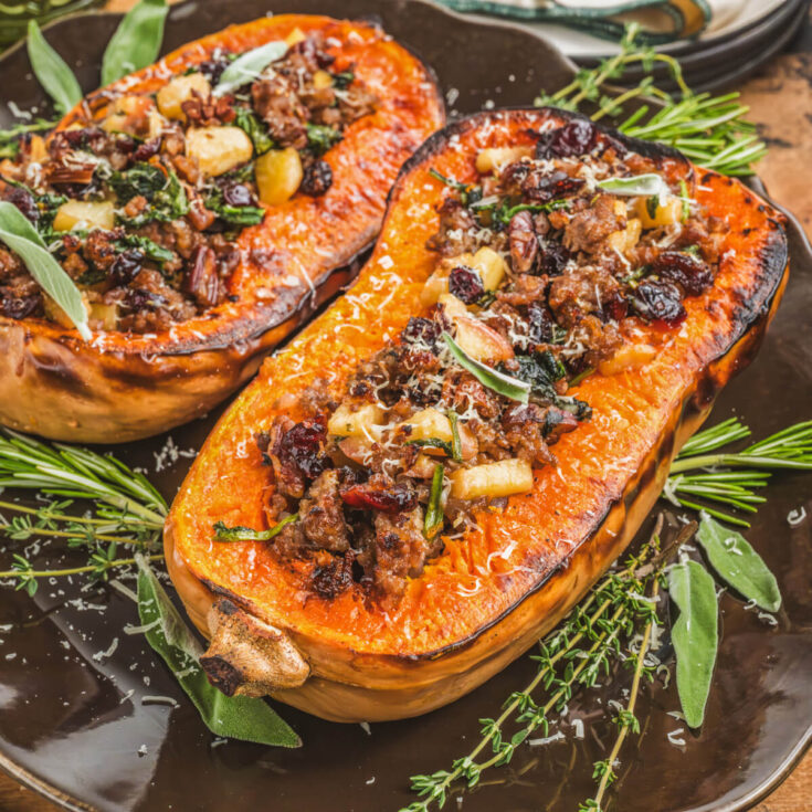 Bright orange roasted squash filled with Italian sausage, pecans, herbs, and dried cranberries then topped with Parmesan cheese.