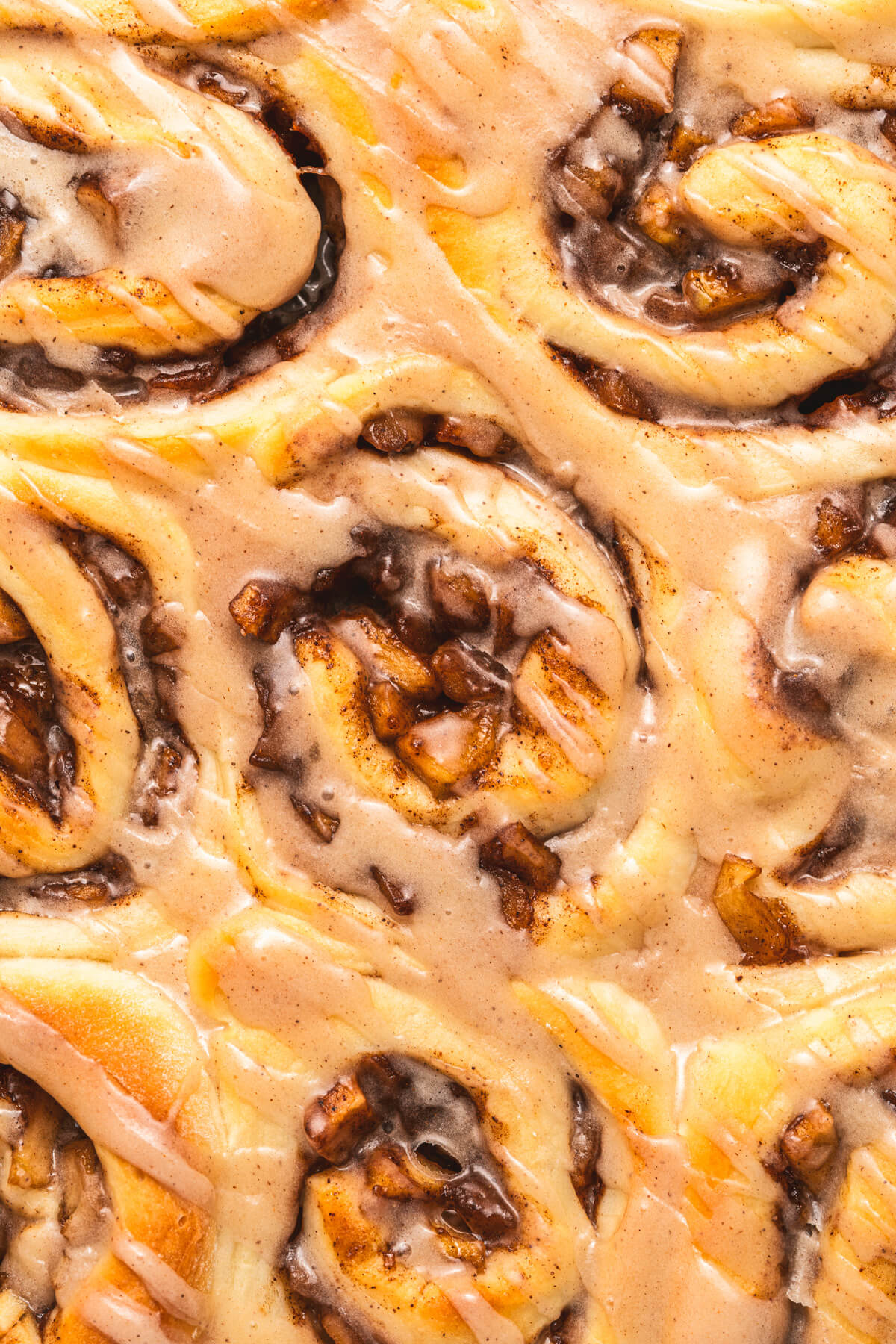 Close up of freshly baked apple pie cinnamon rolls.