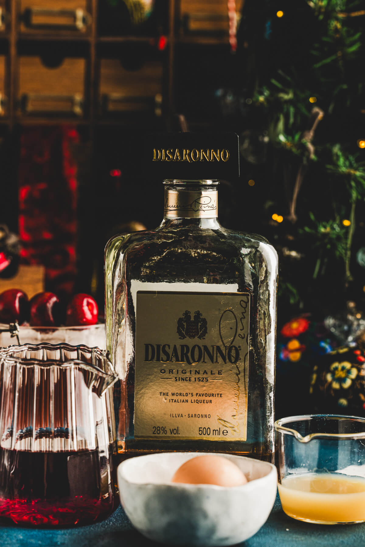 Ingredients required to make a cherry amaretto sour cocktail for two.