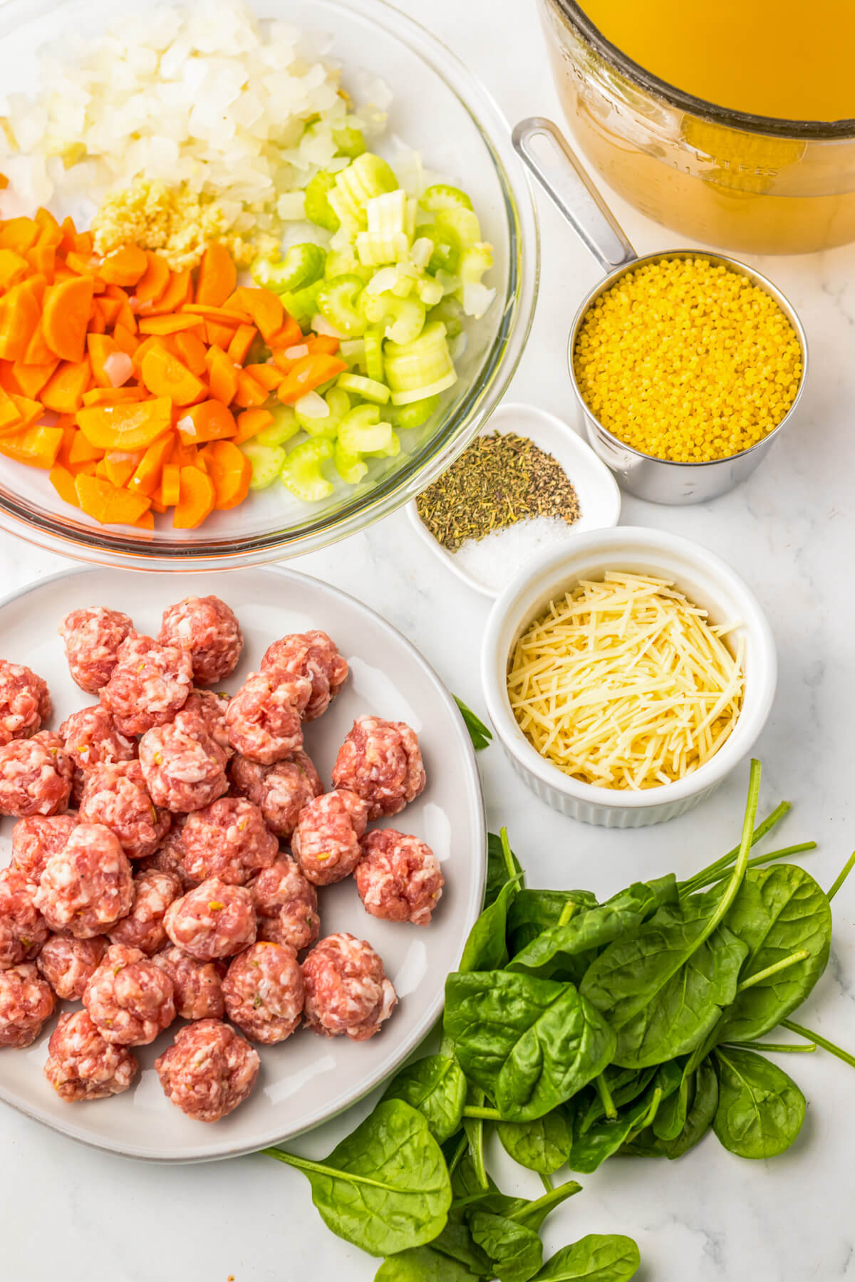 Ingredients required to make Italian Wedding soup in a slow cooker.
