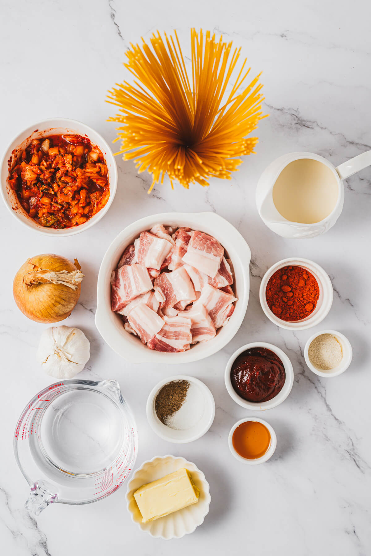 Ingredients required to make Kimchi Pasta with pork belly.