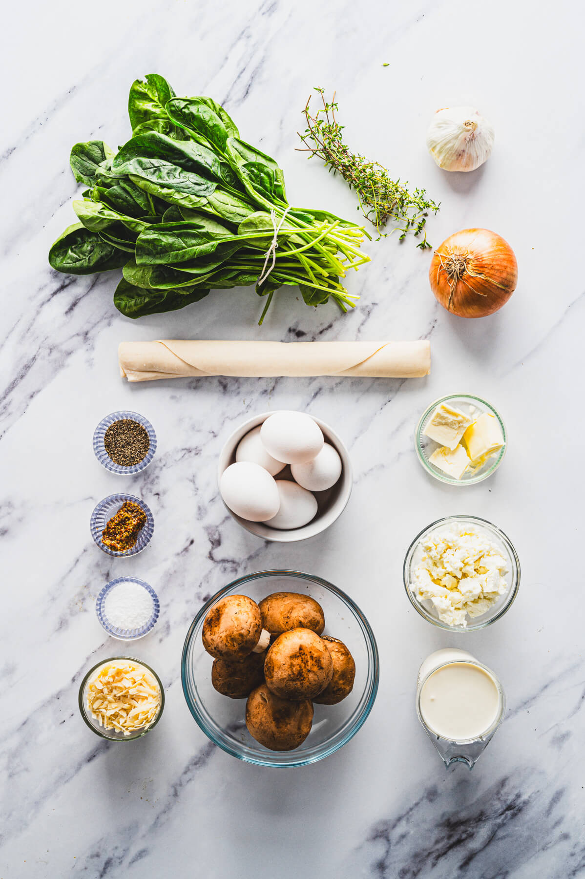 Ingredients required to make spinach mushroom quiche.