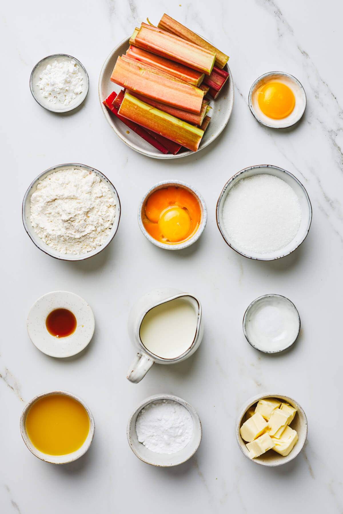 Ingredients required to make rhubarb tart with pastry cream.