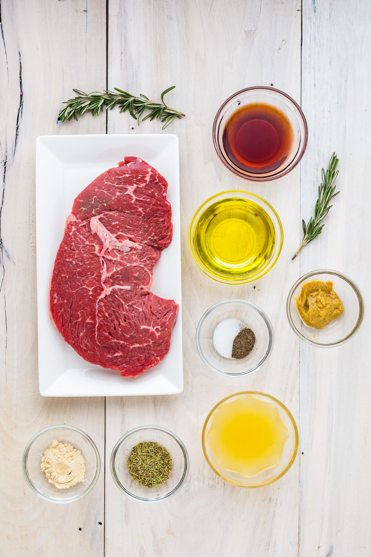 Ingredients required to make a marinated cast iron skillet steak.
