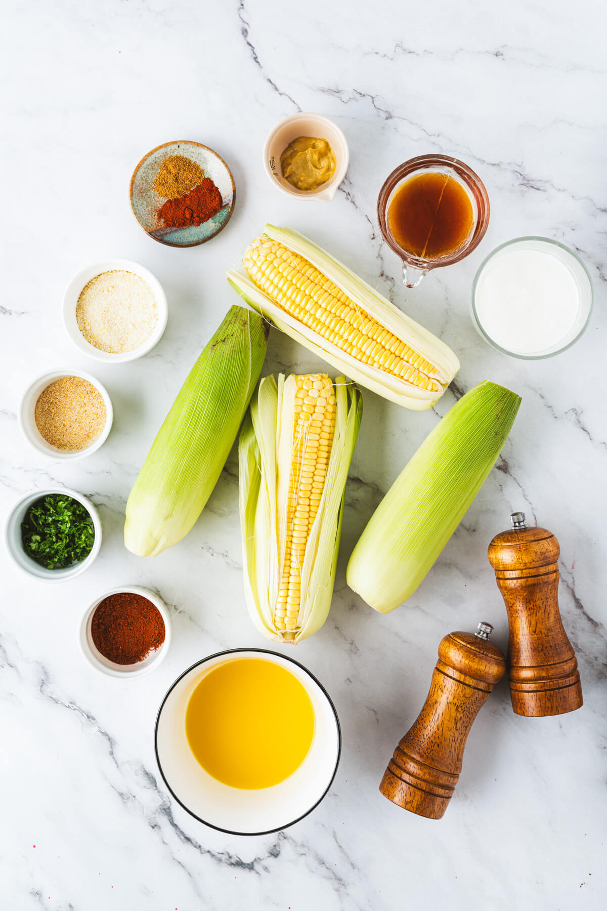 Ingredients required to make tasty corn ribs with creamy dip.