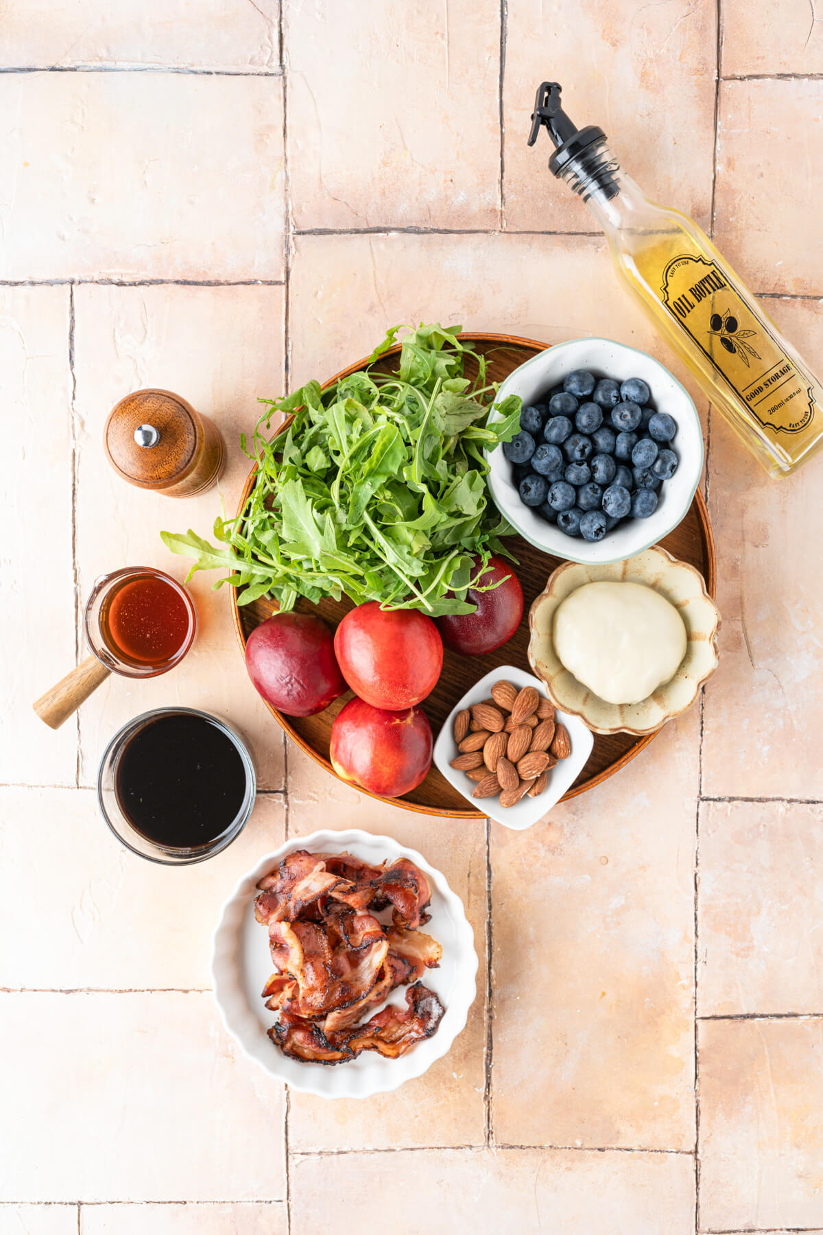 Ingredients required to make a Peach Burrata Salad.