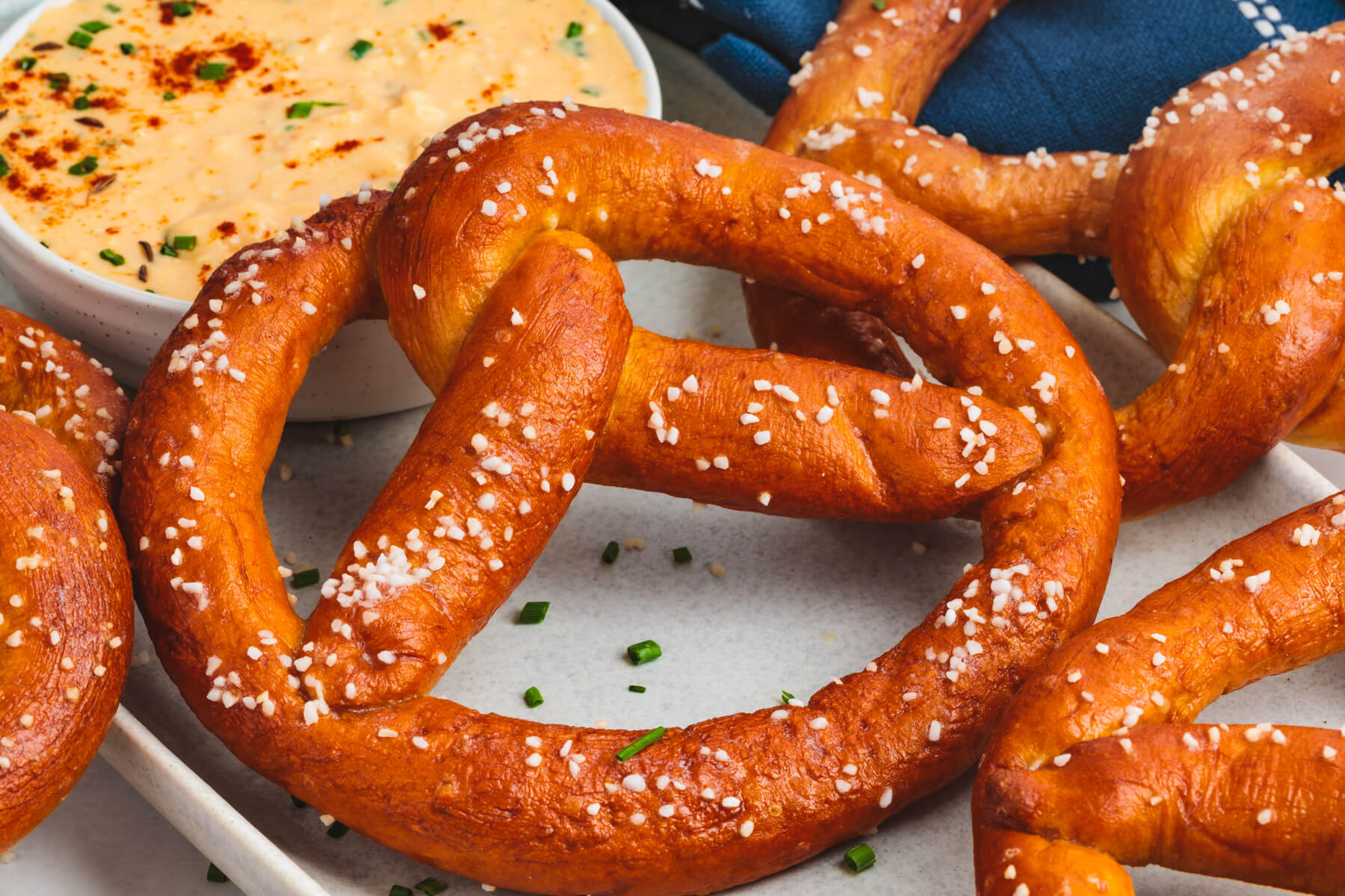 A group of deep brown homemade pretzels.