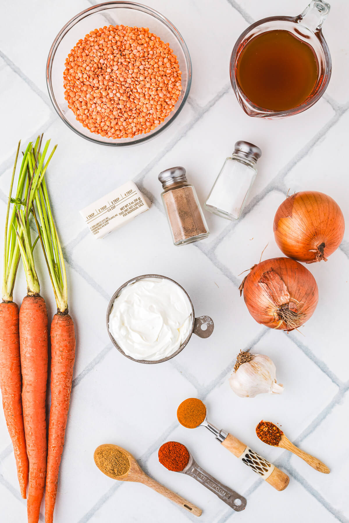 Ingredients required to make carrot lentil soup.