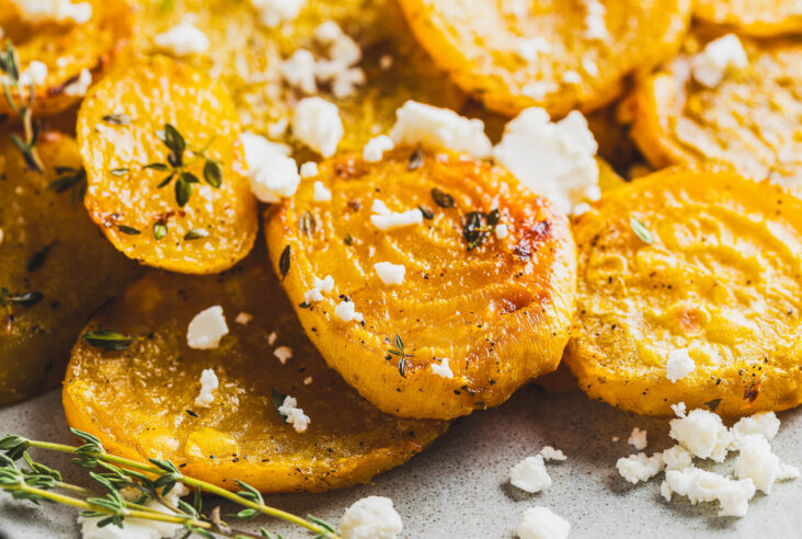 Close up of roasted golden beets showing caramelization.