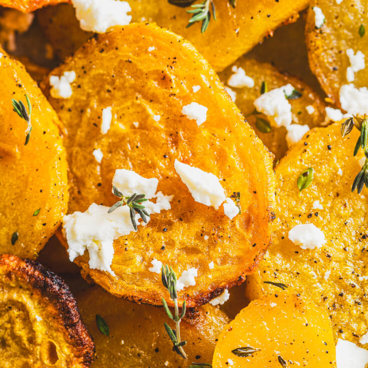 Close up of roasted golden beets showing caramelization.